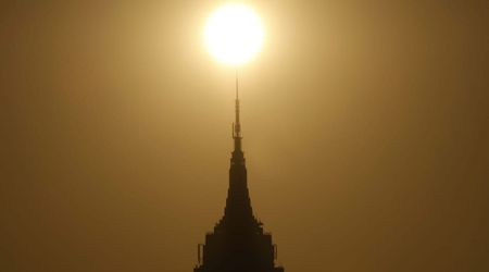 Boston's sky glows an eerie yellow as residents question smoky haze dimming the sun