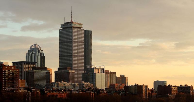 Boston's sky glows an eerie yellow as residents question smoky haze dimming the sun