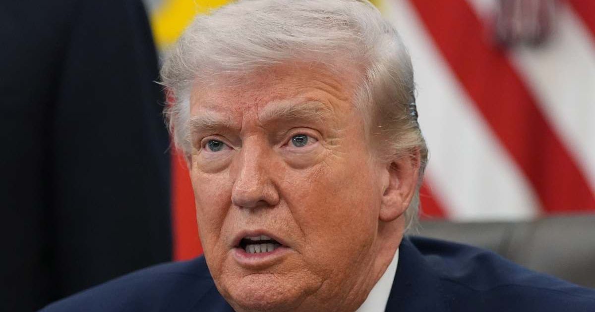 President Donald Trump answers questions from reporters after signing an executive order in the Oval Office of the White House Tuesday, March 31, 2026, in Washington. (AP Photo/Alex Brandon)