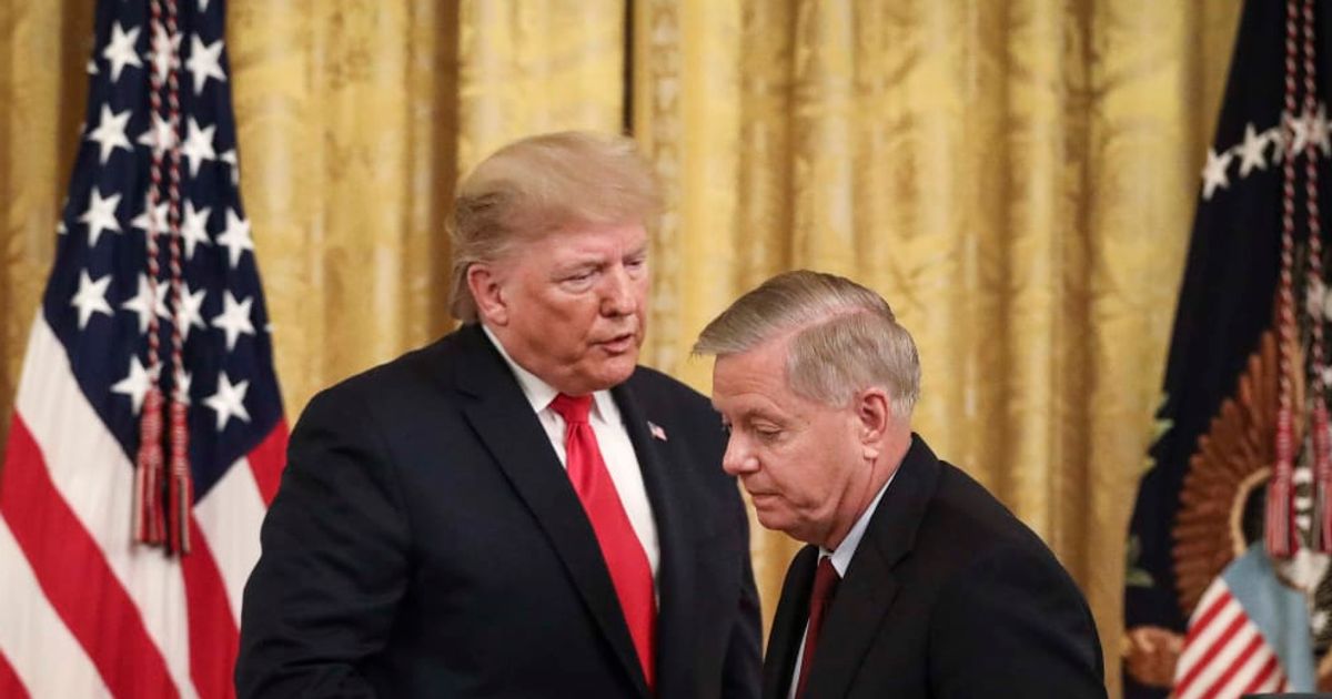  President Donald Trump shakes hands with late Sen Lindsey Graham during an event about judicial confirmations in the East Room of the White House on November 6, 2019 in Washington, DC. (Getty Images)