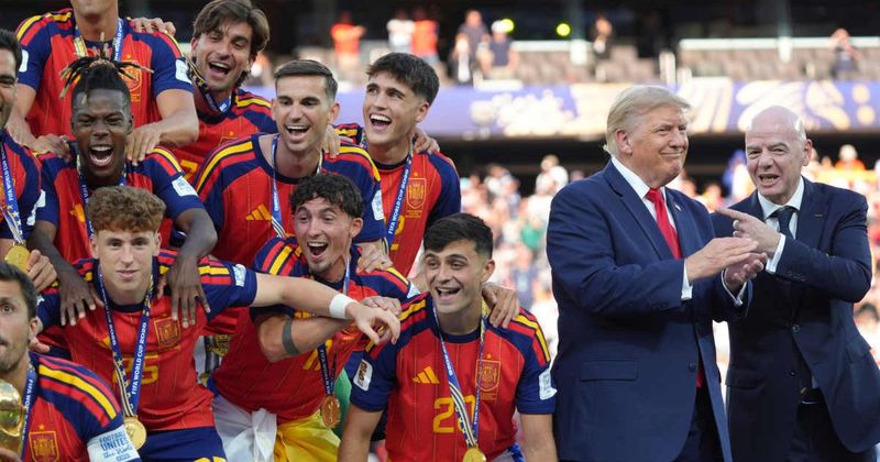 Trump refuses to leave World Cup podium after handing over trophy, awkward moment goes viral