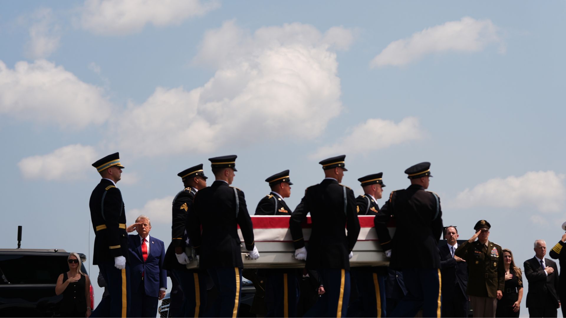 President Donald Trump salutes as a U.S. Army carry team moves a transfer case containing the remains of Sgt. Angel S. Rampersad, of Ozone Park, N.Y. Wednesday, July 22, 2026, at Dover Air Force Base, Del. (AP Photo/Julia Demaree Nikhinson)