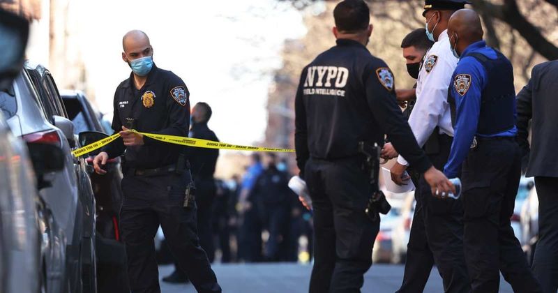 2 men stabbed in NYC in daylight, person of interest held as one victim fights for life