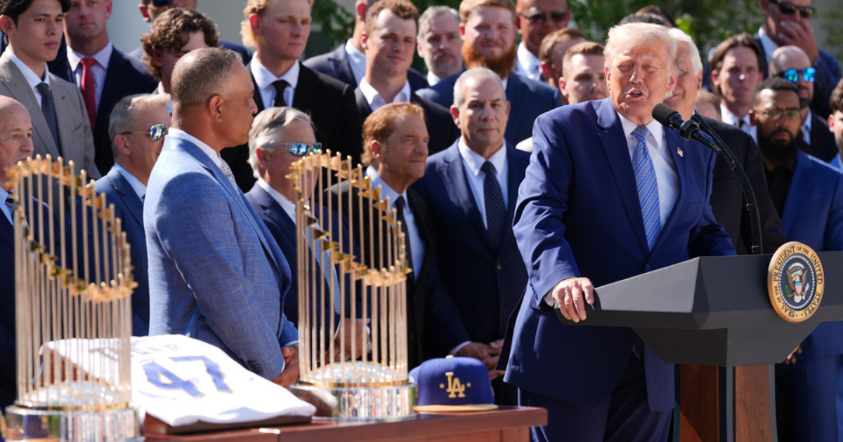 Los Angeles Dodgers owner Mark Walter presented President Donald Trump with a custom No 47 jersey during an event honoring the team's 2025 World Series title in the Rose Garden of the White House on Thursday, July 23  (AP Photo/Alex Brandon)