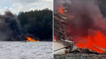 Plane carrying 11 catches fire after emergency crash landing off Washington island