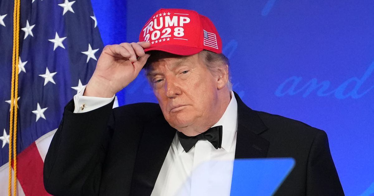 President Donald Trump put on a ‘TRUMP 2028’ hat while joking about a possible fourth-term run during the White House Correspondents’ Dinner in Washington, DC (AP Photo/Mark Schiefelbein)