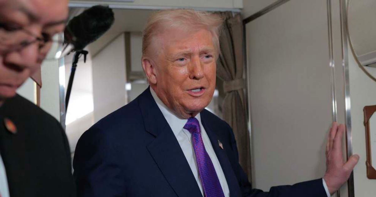 President Donald Trump talks to reporters on board Air Force One on February 19, 2026 at Joint Base Andrews, Maryland. (Chip Somodevilla/Getty Images)