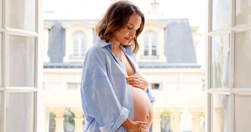 Natalie Portman cradles her baby bump in rare photo as she prepares to welcome third child