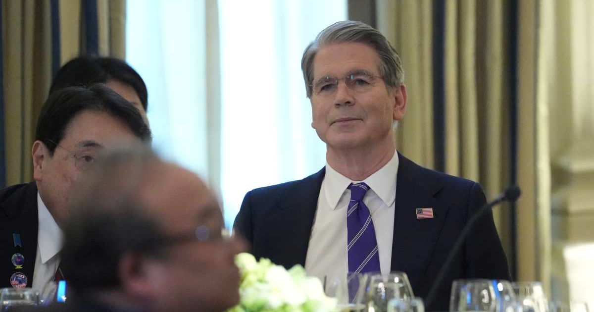 Treasury Secretary Scott Bessent arrives to attend a dinner in the State Dining Room of the White House, Thursday, March 19, 2026, in Washington. (AP Photo/Julia Demaree Nikhinson)
