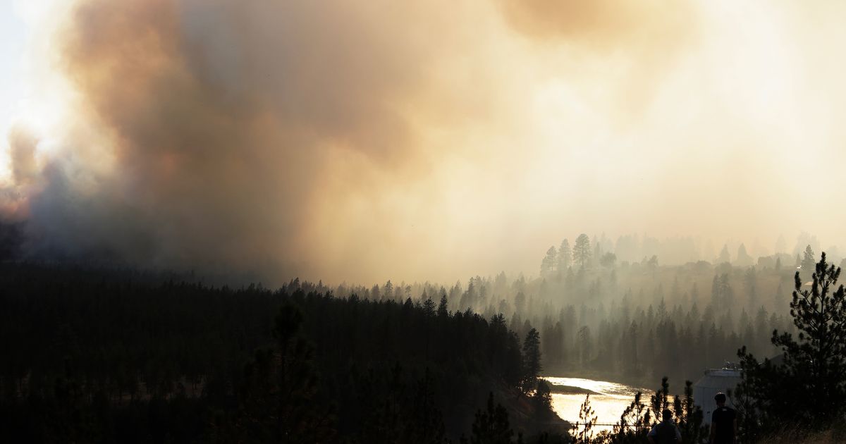 Old Trails Fire is seen from W Northwest Blvd, Saturday, Aug 1, 2026, in Spokane, Washington (AP Photo/Young Kwak)