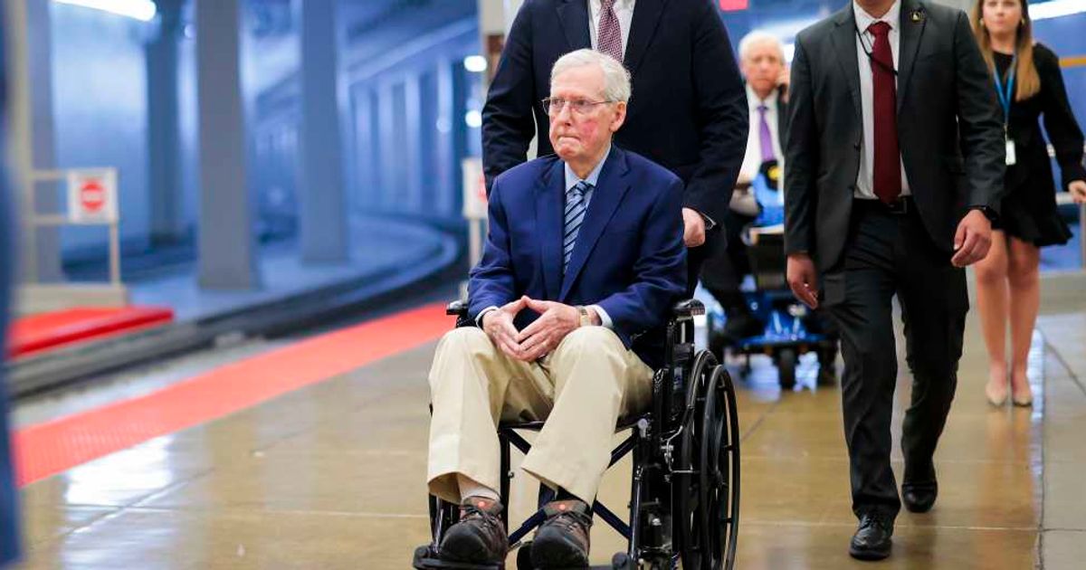 Sen Mitch McConnel is pushed in a wheelchair through the Senate Subway during the Senate War Powers vote on April 22, 2026 in Washington, DC (Getty Images)