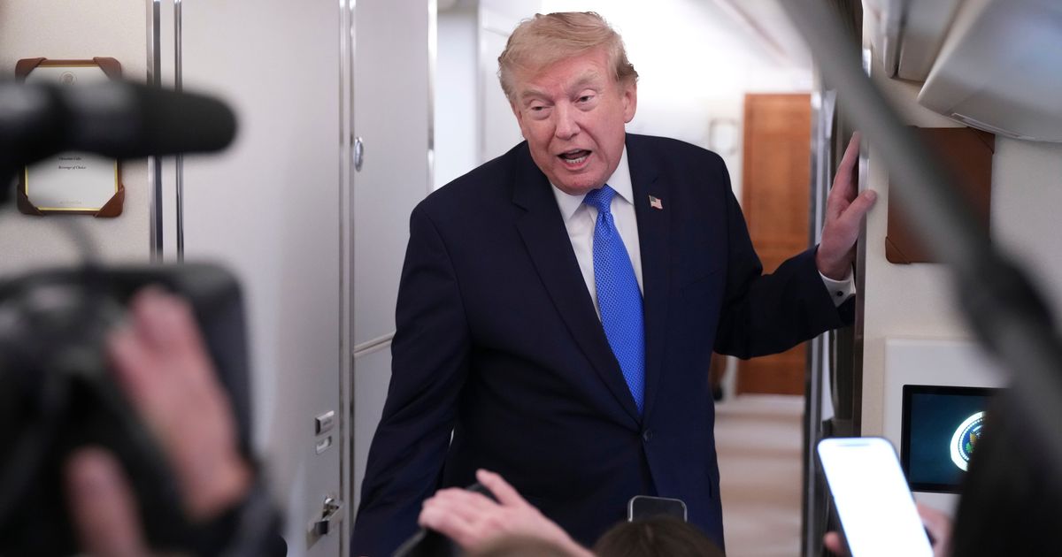 President Donald Trump speaks to reporters onboard Air Force One while returning to the White House on Sunday, August 2, 2026 (AP Photo/Jacquelyn Martin)