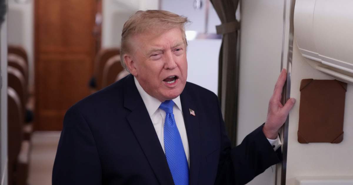 President Donald Trump speaks to reporters onboard Air Force One while returning to the White House, Sunday, Aug. 2, 2026 (AP Photo/Jacquelyn Martin)