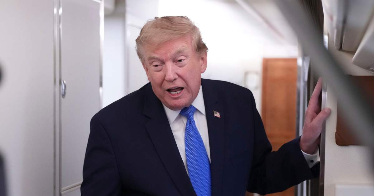 President Donald Trump speaks to reporters onboard Air Force One while returning to the White House, Sunday, Aug. 2, 2026 (AP Photo/Jacquelyn Martin)