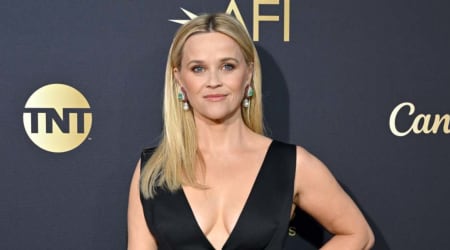 Reese Witherspoon speaks out after dad John, 84, is rushed to hospital following poolside fall