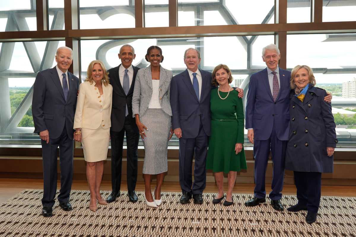 Former President Joe Biden and former first lady Jill Biden, from left, former President Barack Obama and former first lady Michelle Obama, former President George W. Bush and former first lady Laura Bush, and former President Bill Clinton and former Secretary of State Hillary Clinton, pose for a photo ahead of the dedication ceremony at the Obama Presidential Center, Thursday, June 18, 2026, in Chicago. (AP Photo/Pablo Martinez Monsivais, Pool)