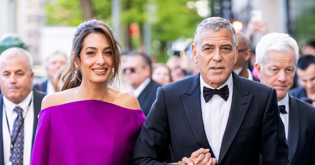 Divorce speculation surrounding George and Amal Clooney intensified after images of the 'Ocean's Eleven' actor with Emma Watson at their Lake Como villa went viral (Gilbert Carrasquillo/GC Images)
