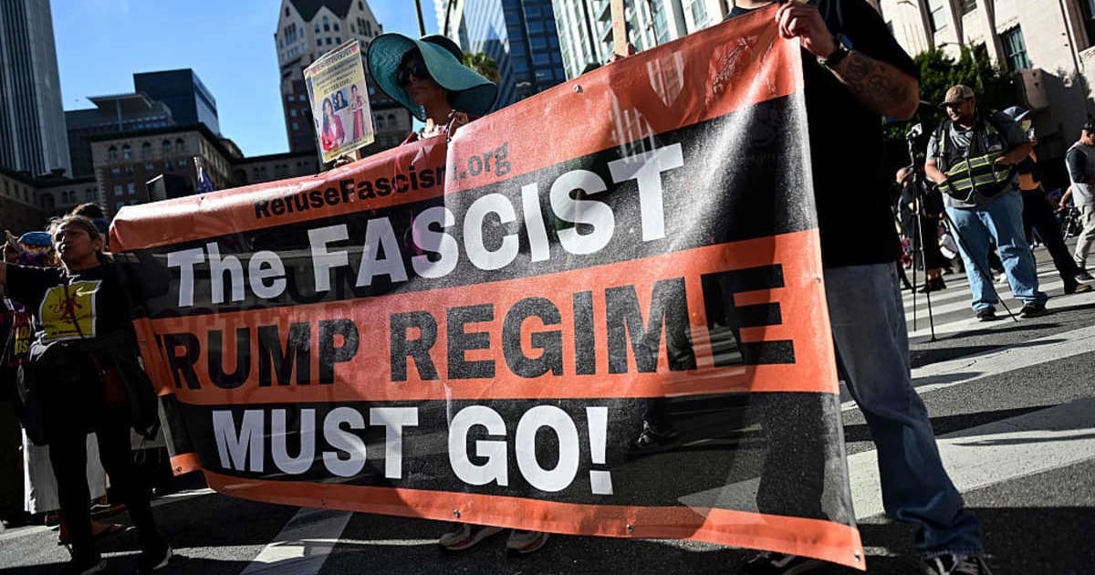 Four US human rights groups filed suit over Trump's ICC sanctions, which they said limited filings, victim aid, collaboration, and advocacy in ongoing investigations (Sarah Morris/Getty Images)