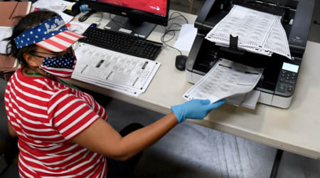 Trump uses mail-in voting despite repeatedly attacking the system as a ‘scam’