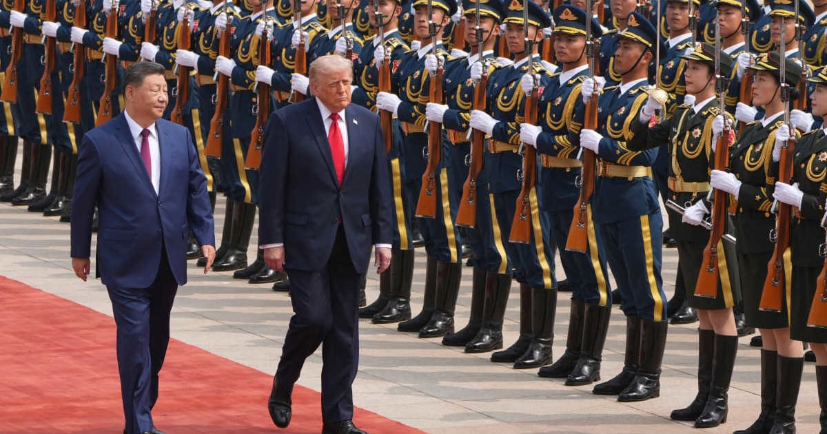 The American citizen's arrest came just weeks after President Donald Trump attended a summit in Beijing with Chinese President Xi Jinping (AP Photo/Mark Schiefelbein)