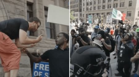 Chaos goes off the rails as protesters mob Jake Lang's truck and pepper spray flies