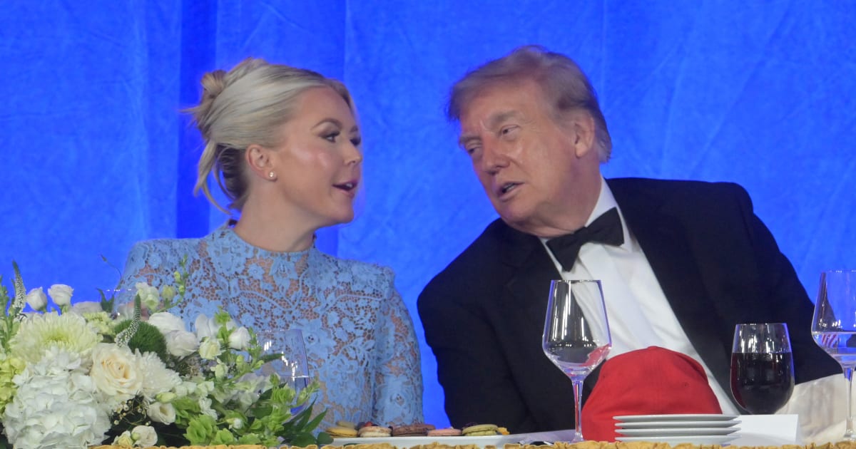 President Donald Trump talks with White House Press Secretary Karoline Leavitt at the White House Correspondents' Association dinner at the Waldorf Astoria Washington DC, Friday, July 24, 2026, in Washington (AP Photo/Rod Lamkey, Jr)