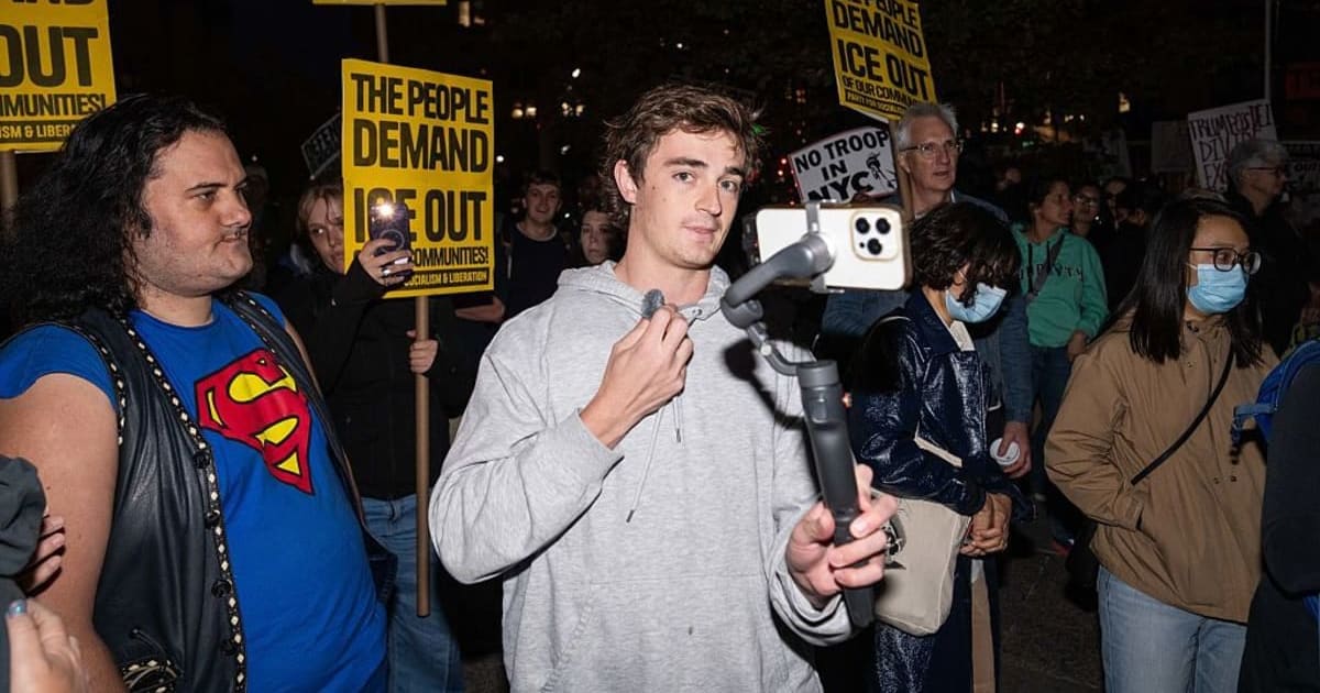 Conservative influencer Nick Shirley films protestors demonstrating against  Immigration and Customs Enforcement (ICE) arrests on October 22, 2025, in New York City (Getty Images)