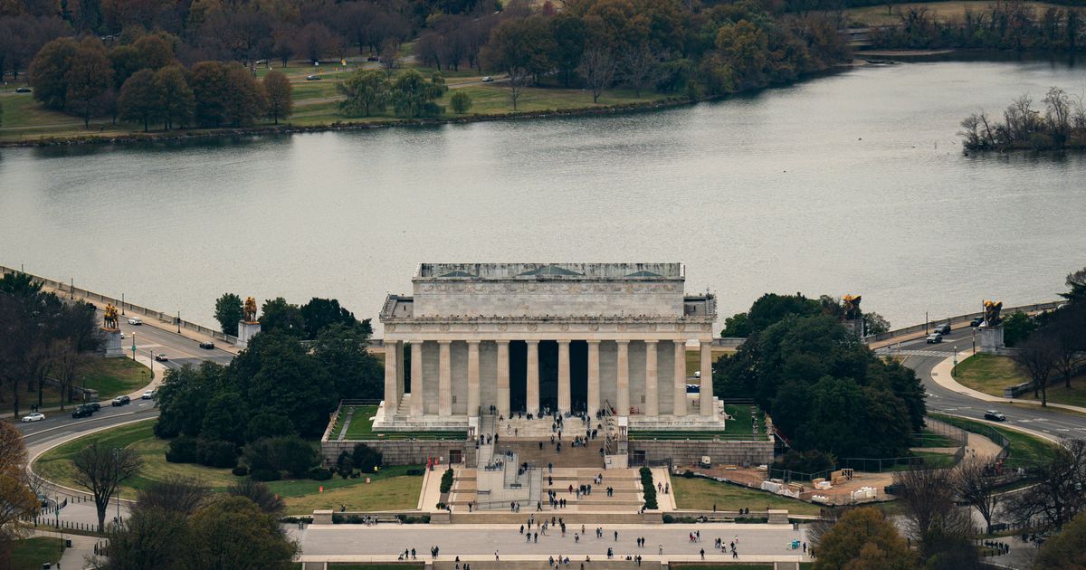 New images showed the Washington Monument and Lincoln Memorial reflected in water as restoration work continued on the National Mall (Al Drago/Getty Images)