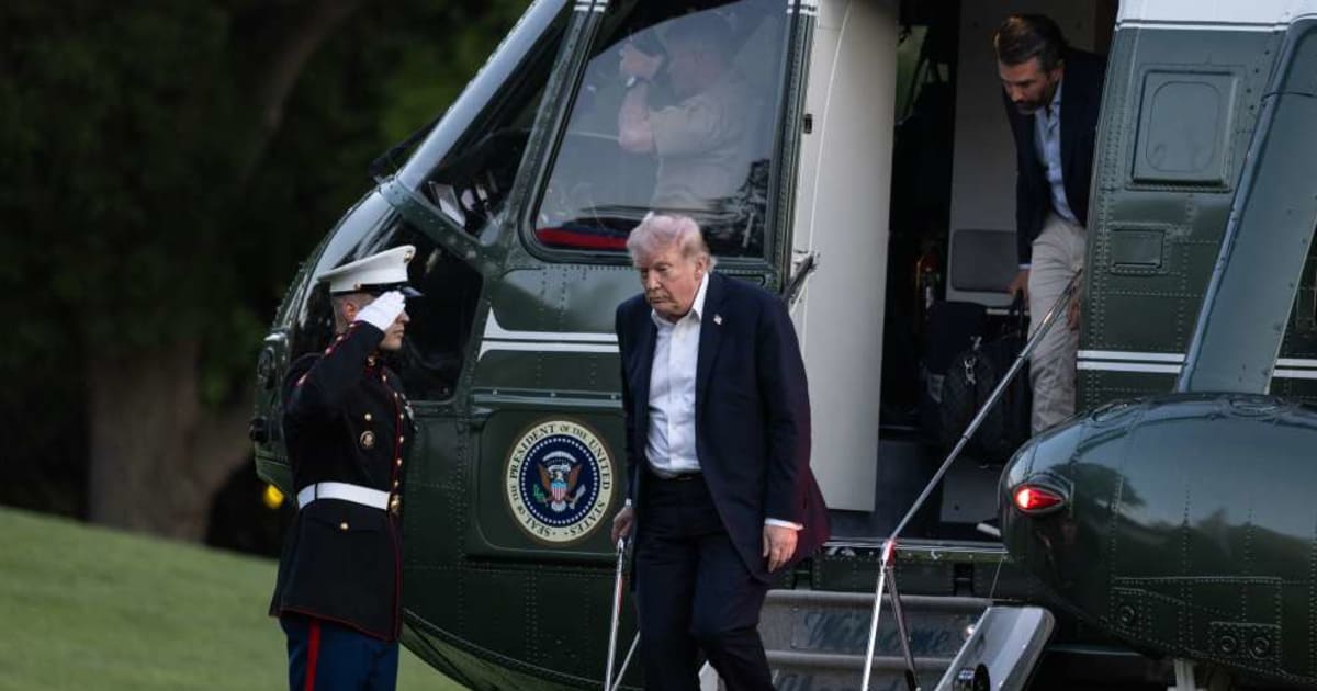 President Donald Trump, followed by son Donald Trump Jr, disembarks Marine One upon returning to the White House from Florida on May 3, 2026, in Washington, DC (Anna Rose Layden/Getty Images)