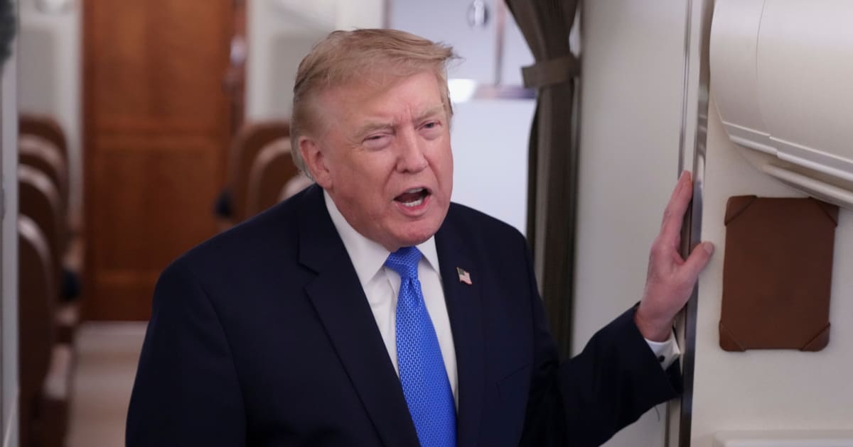 President Donald Trump speaks to reporters onboard Air Force One while returning to the White House, Sunday, Aug. 2, 2026 (AP Photo/Jacquelyn Martin)