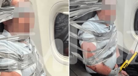 Passenger duct-taped to first-class seat as American Airlines flight makes emergency landing