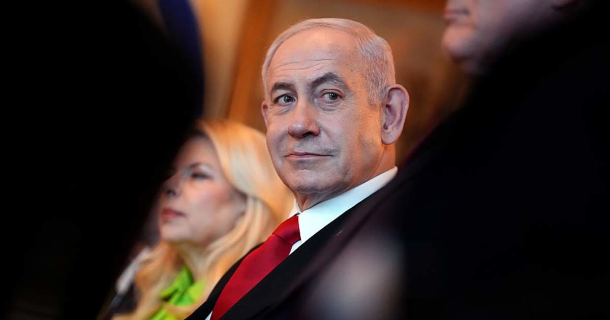 Israeli Prime Minister Benjamin Netanyahu speaks during a dinner with President Donald Trump in the Blue Room of the White House on July 7, 2025, in Washington, DC (Getty Images) 