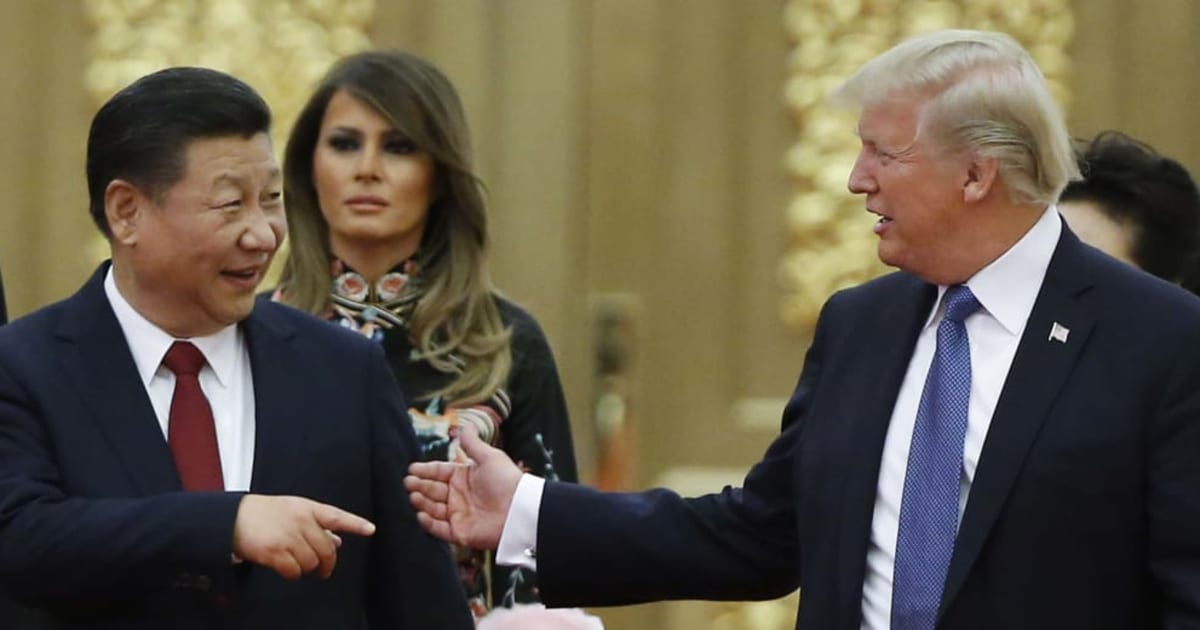 President Donald Trump and China's President Xi Jinping arrive at a state dinner at the Great Hall of the People on November 9, 2017, in Beijing, China (Getty Images)