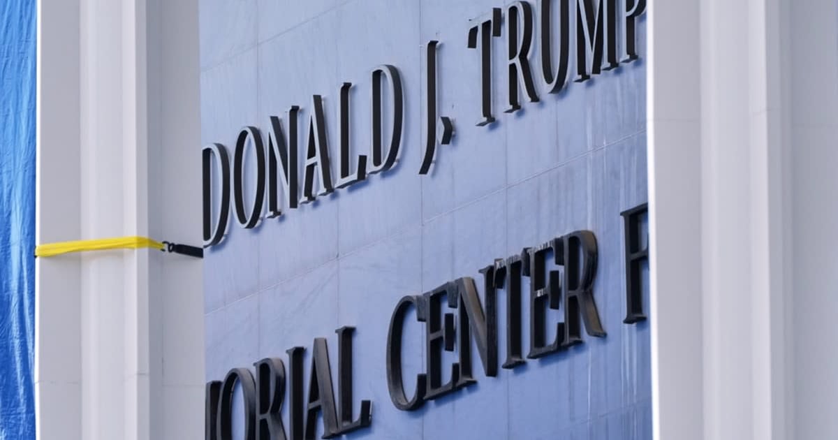 Trump's push to add his name to Kennedy Center has hit a road block after a court blocked the request  (AP Photos)
