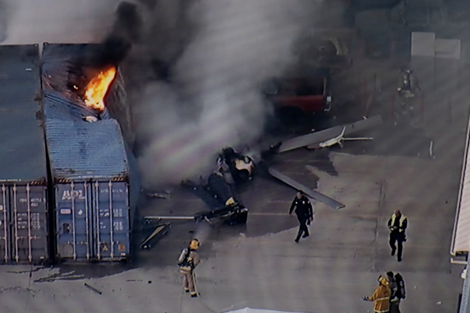 In this still image provided by KABC-TV shows first responders work the scene after a helicopter crashed near a bus crash in Chatsworth, a neighborhood in Los Angeles, Tuesday, Sept. 15, 2026. (KABC-TV via AP)