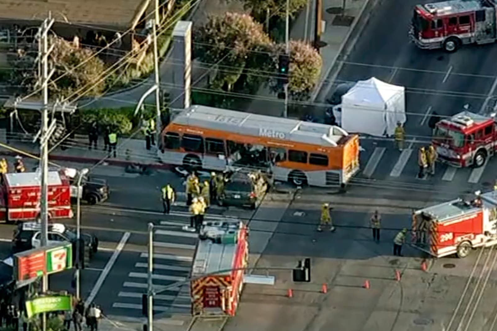 In this still image provided by KABC-TV shows firefighters respond to a deadly bus crash, in Los Angeles on Tuesday, Sept. 15, 2026. (KABC-TV via AP)