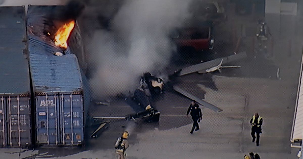 This still image provided by KABC-TV shows first responders work the scene after a helicopter crashed near a bus crash in Chatsworth, a neighborhood in Los Angeles, Tuesday, September 15, 2026 (KABC-TV via AP)