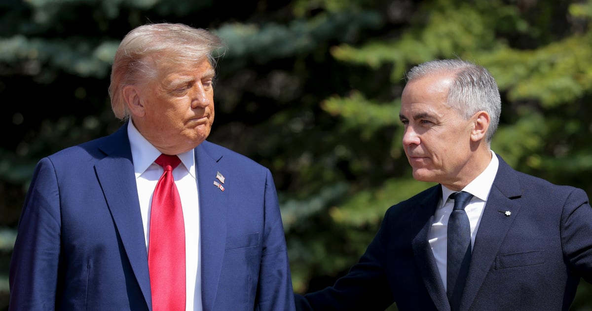 Canadian Prime Minister Mark Carney greets President Donald Trump at the official welcome ceremony during the G7 Leaders' Summit on June 16, 2025, in Kananaskis, Alberta (Getty Images)
