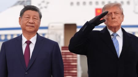 Trump’s gloves and winter coat steal attention as Xi Jinping gets lavish US military welcome