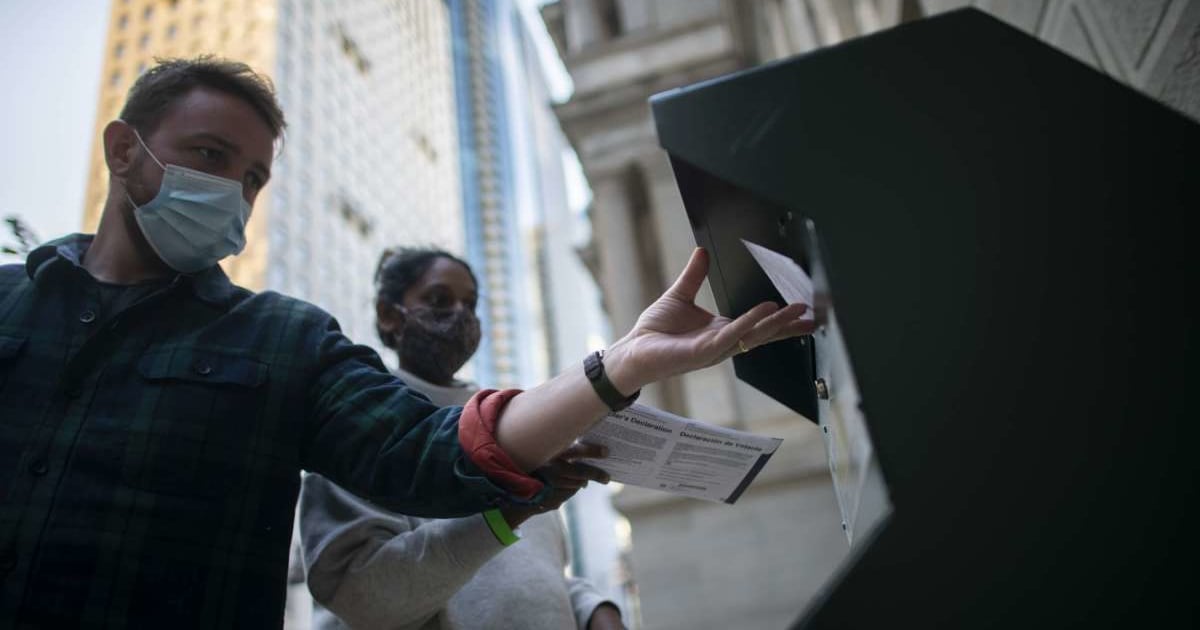 Voters cast their early voting ballot at drop box outside of City Hall on October 17, 2020, in Philadelphia, Pennsylvania (Getty Images)