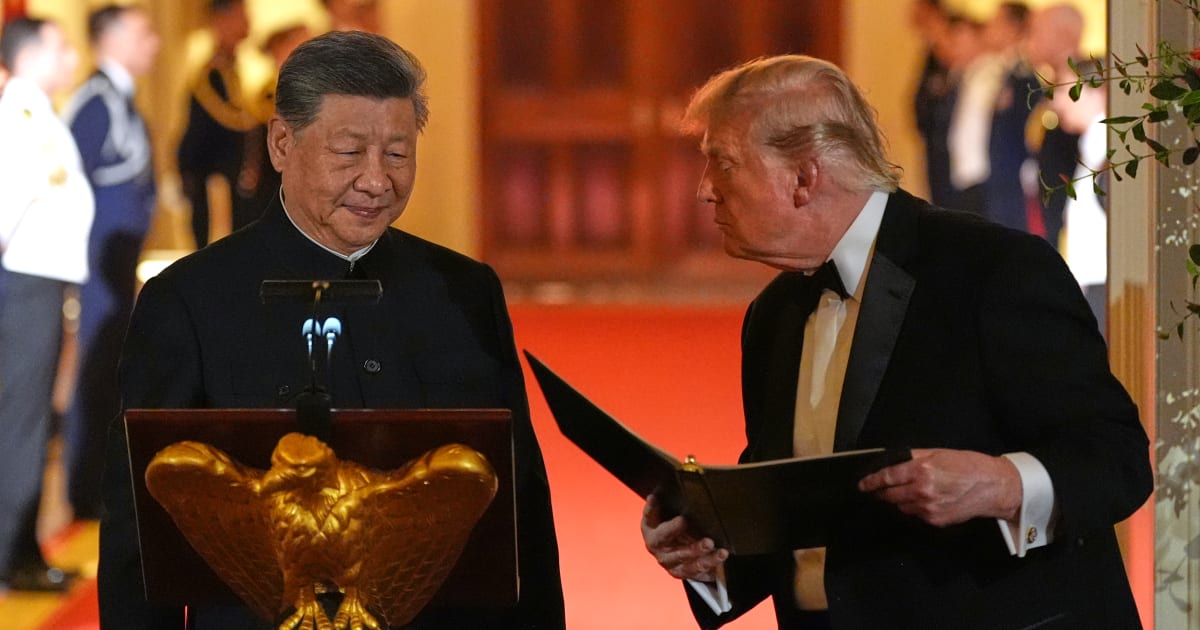 President Donald Trump talks with China's President Xi Jinping during a State Dinner in the East Room of the White House, Thursday, Sept. 24, 2026, in Washington (AP Photo/Alex Brandon)