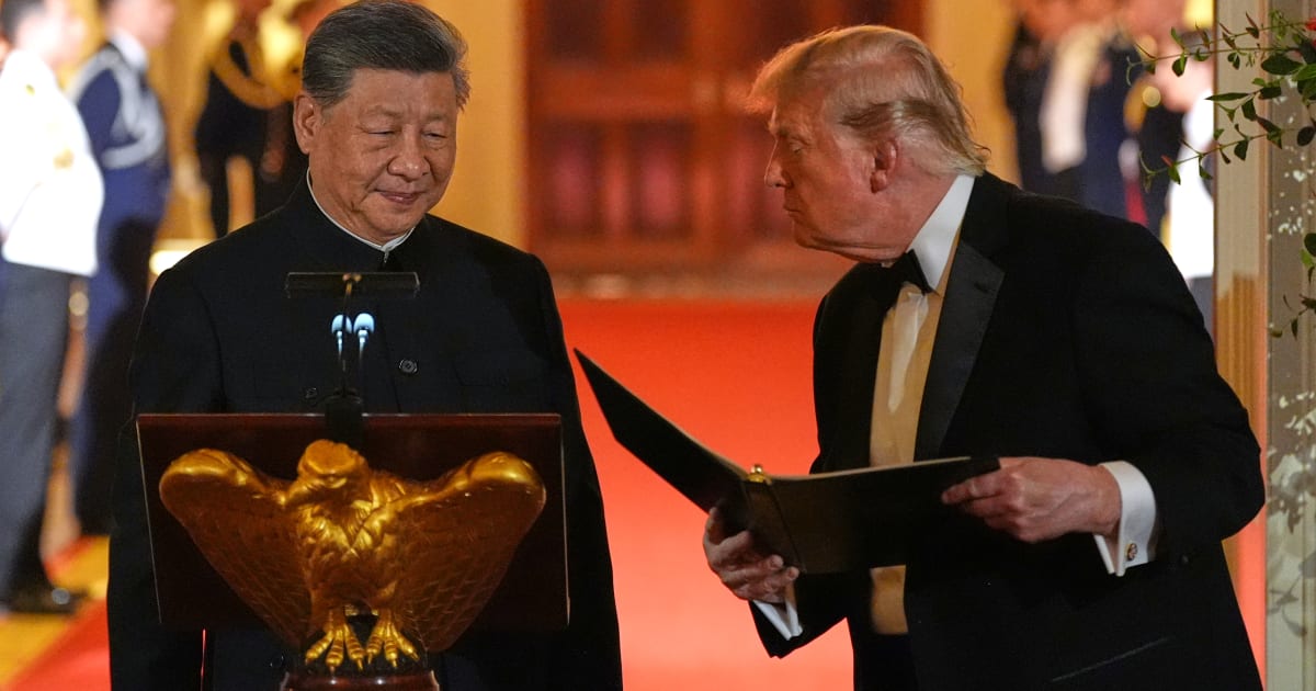 President Donald Trump talks with China's President Xi Jinping during a State Dinner in the East Room of the White House, Thursday, September 24, 2026, in Washington (AP Photo/Alex Brandon)