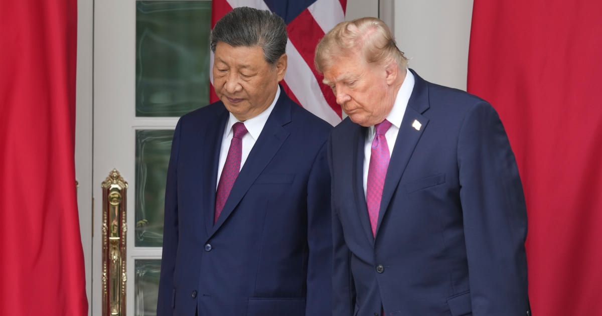 President Donald Trump and China's President Xi Jinping arrive to watch a military review in the Rose Garden of the White House, Thursday, Sept. 24, 2026, in Washington (AP Photo/Alex Brandon)