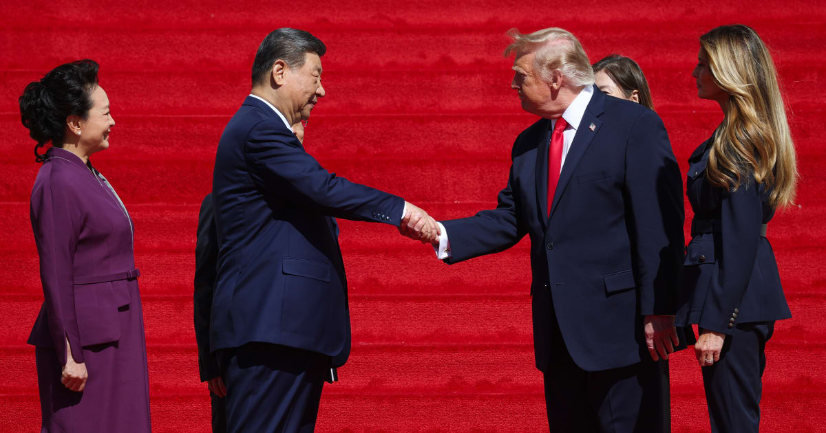 US President Donald Trump and US first lady Melania Trump greeted China's President Xi Jinping and his wife, Peng Liyuan (Win McNamee/Getty Images)