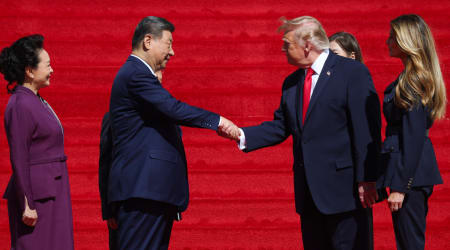 Melania Trump appears to step back as Donald greets Xi Jinping with handshake