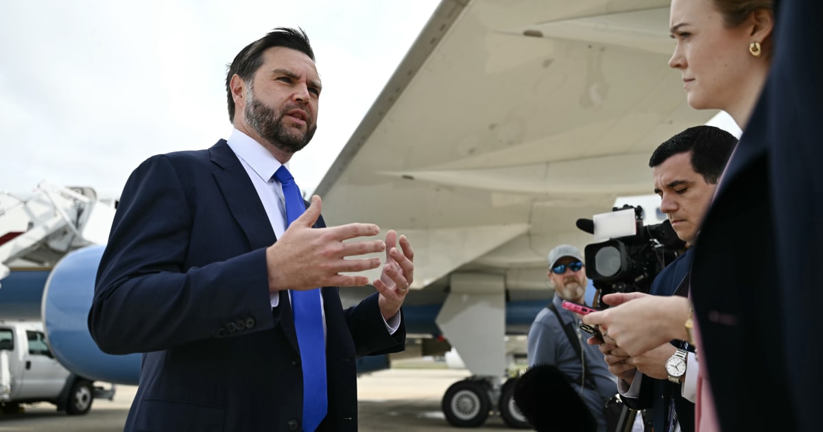 Vice President JD Vance talks to reporters before boarding Air Force Two on September 21, 2026 (Kent Nishimura-Pool/Getty Images)