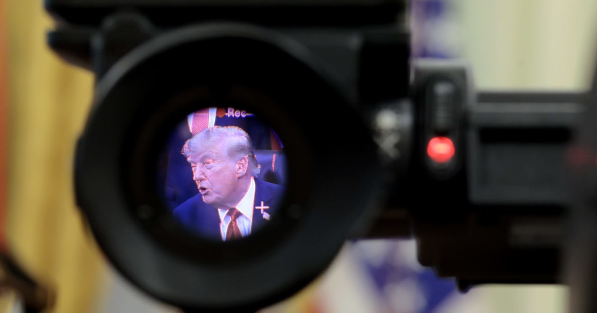 President Donald Trump seen through the lens of a video camera (Getty Images)
