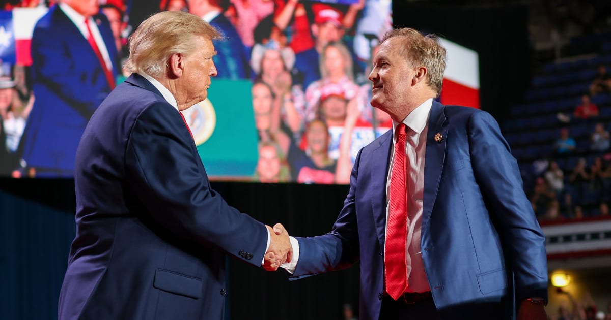 President Donald Trump shakes hands with Republican Senate candidate Texas Attorney General Ken Paxton as he brings him on stage during a campaign rally at the Freeman Coliseum on October 7, 2026, in San Antonio, Texas (Getty Images)