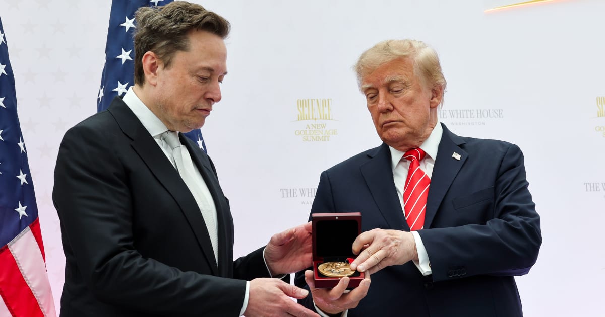 Elon Musk (L) receives the National Medal of Science from President Donald Trump during the Golden Age of American Innovation Summit at the Institute of Peace on October 08, 2026 (Getty Images)